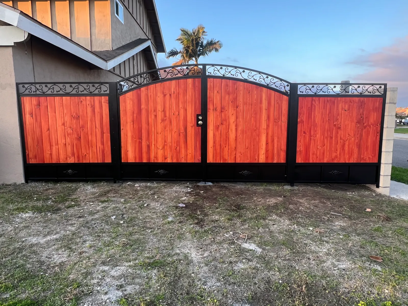Traditional Mixed-Metal Driveway Gates