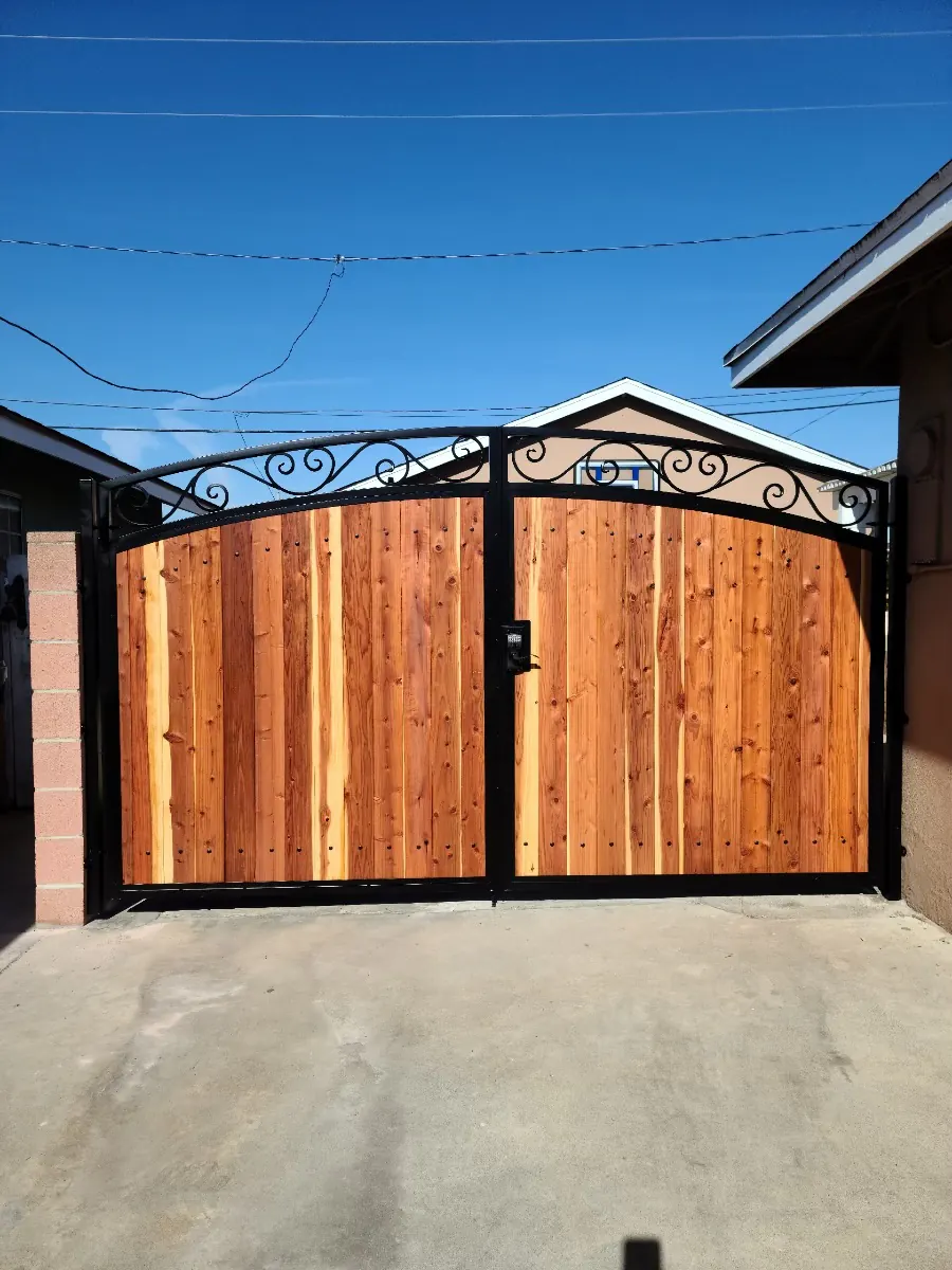 Traditional Mixed-Metal Driveway Gates