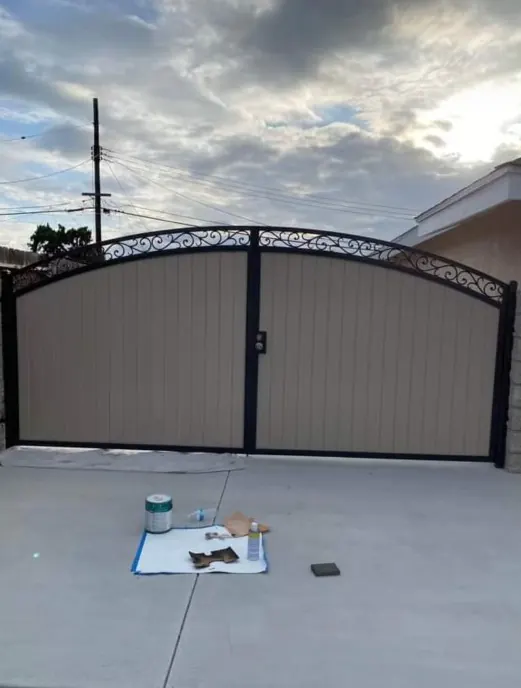 Traditional Mixed-Metal Driveway Gates