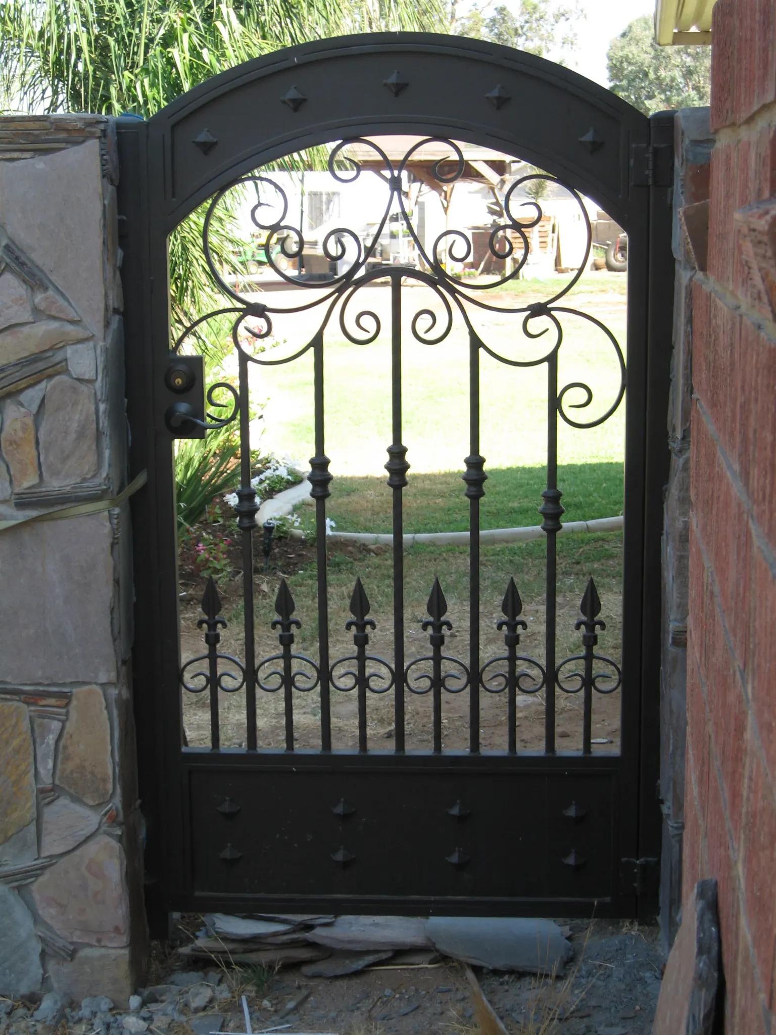 Ornate Wrought-Iron Side Gates